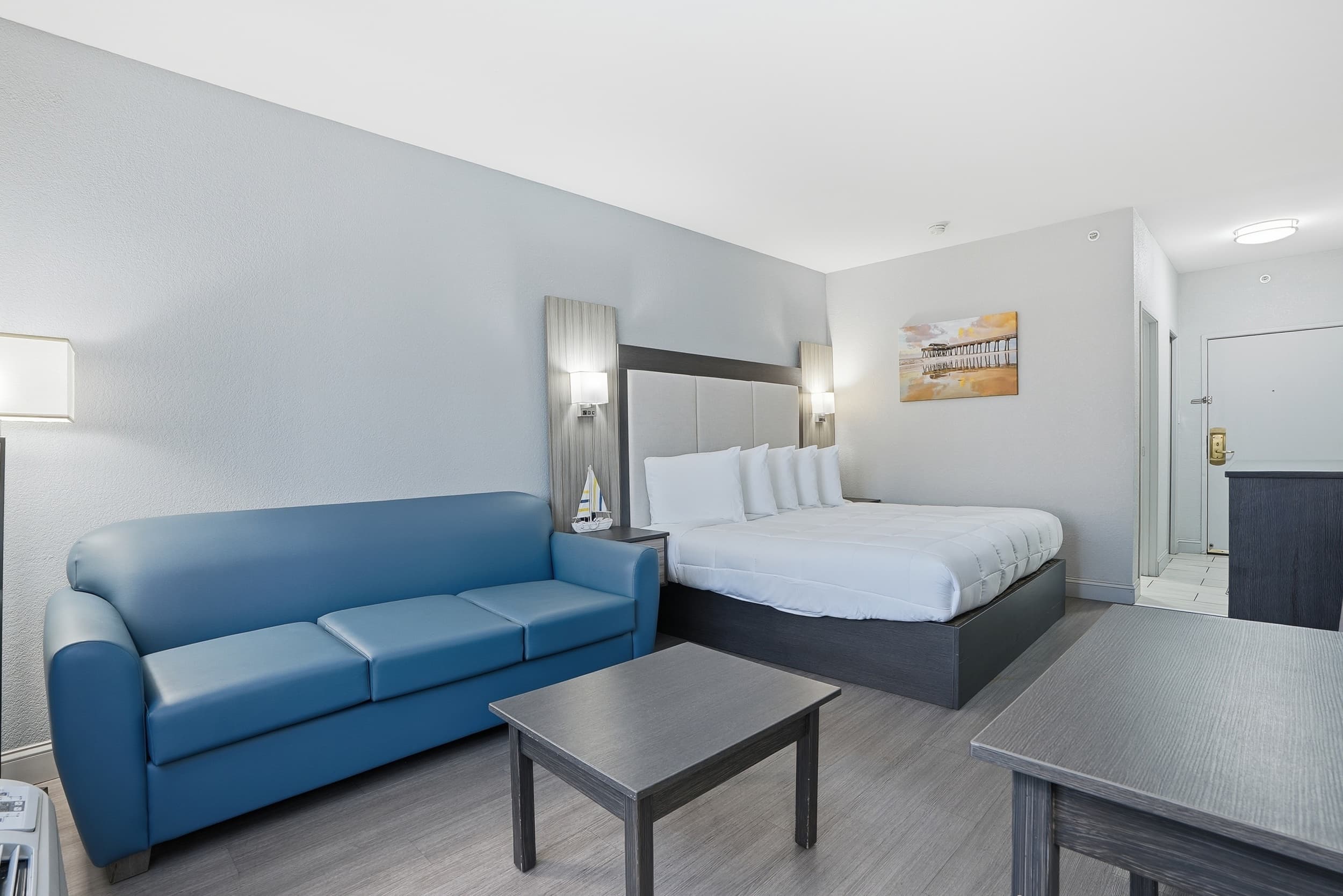 A king suite with sleeper sofa at Admiral's Inn